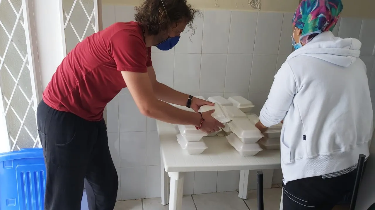 Handing out donations converted into food to the local hospital. Since restaurants weren't allowed to open, they didn't have where to eat.