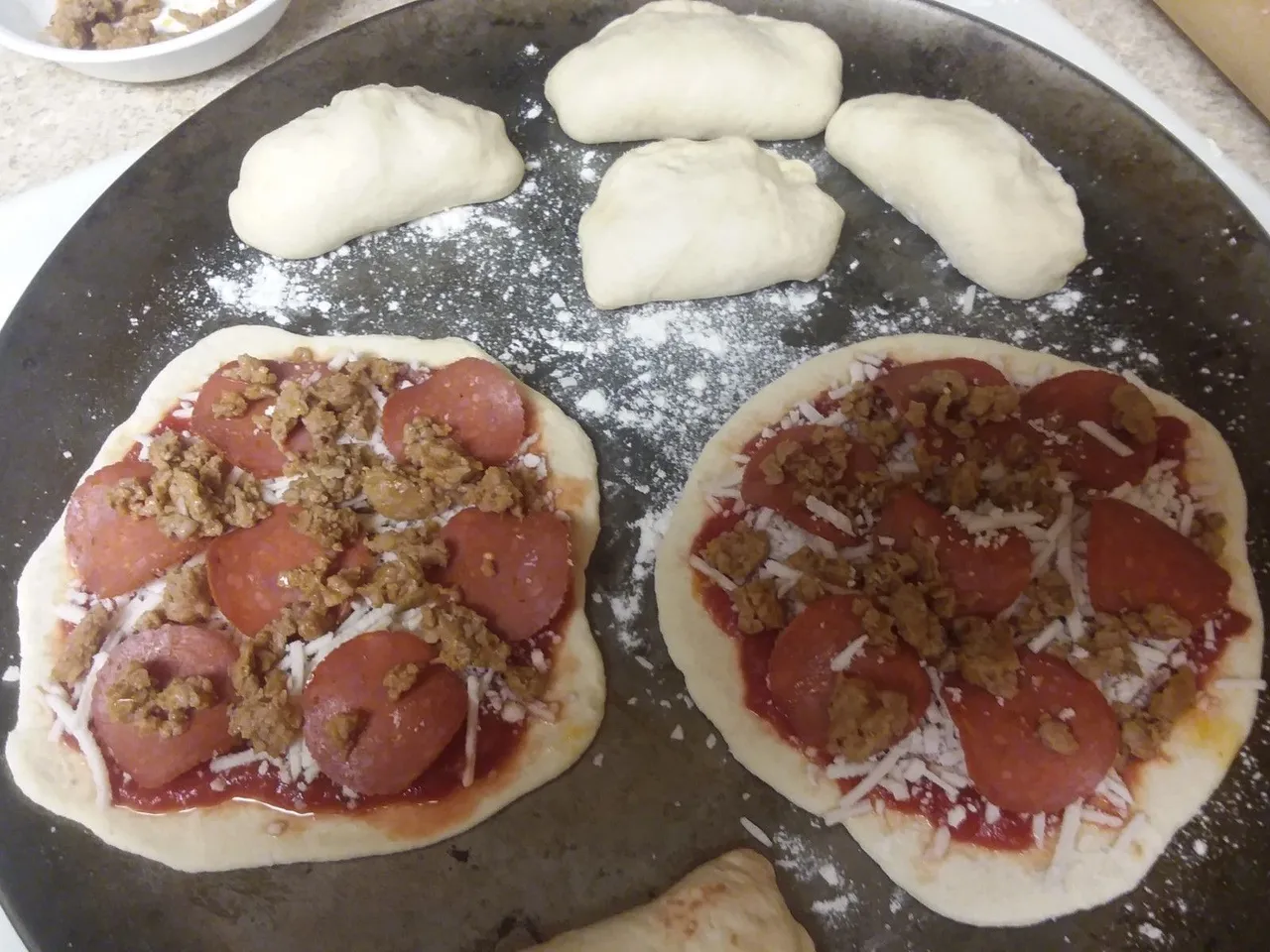 mini calzones and pizzas.jpg