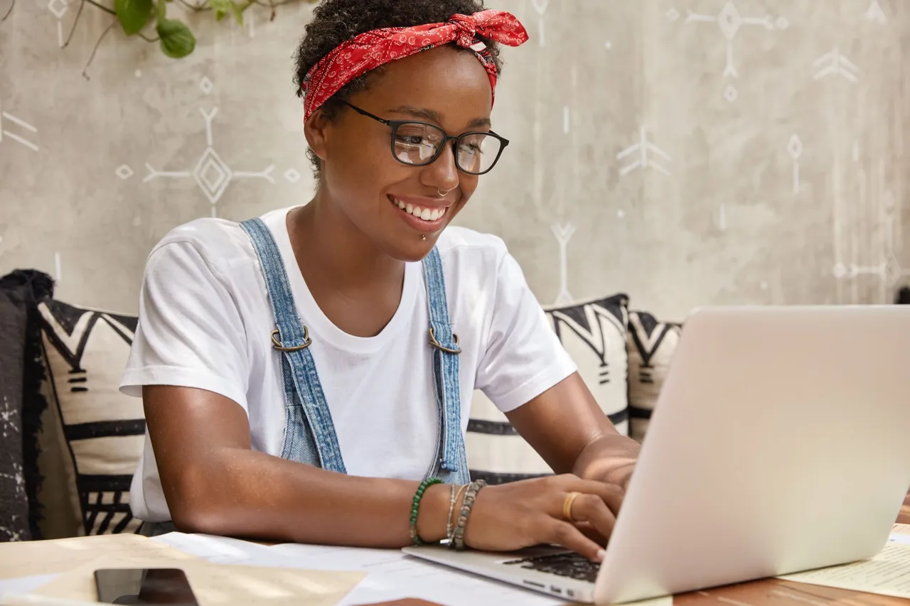 stylish-businesswoman-works-laptop-computer-cozy-coffee-shop-keyboards-information.jpg
