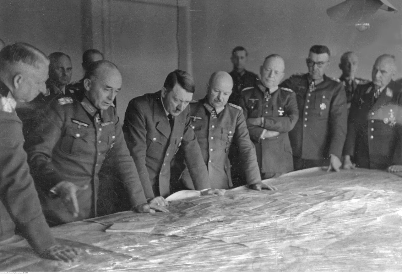 Adolf_Hitler_during_a_conference_with_officers_on_the_Eastern_Front.jpg