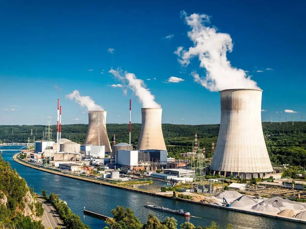 A nuclear power plant with their cooling towers