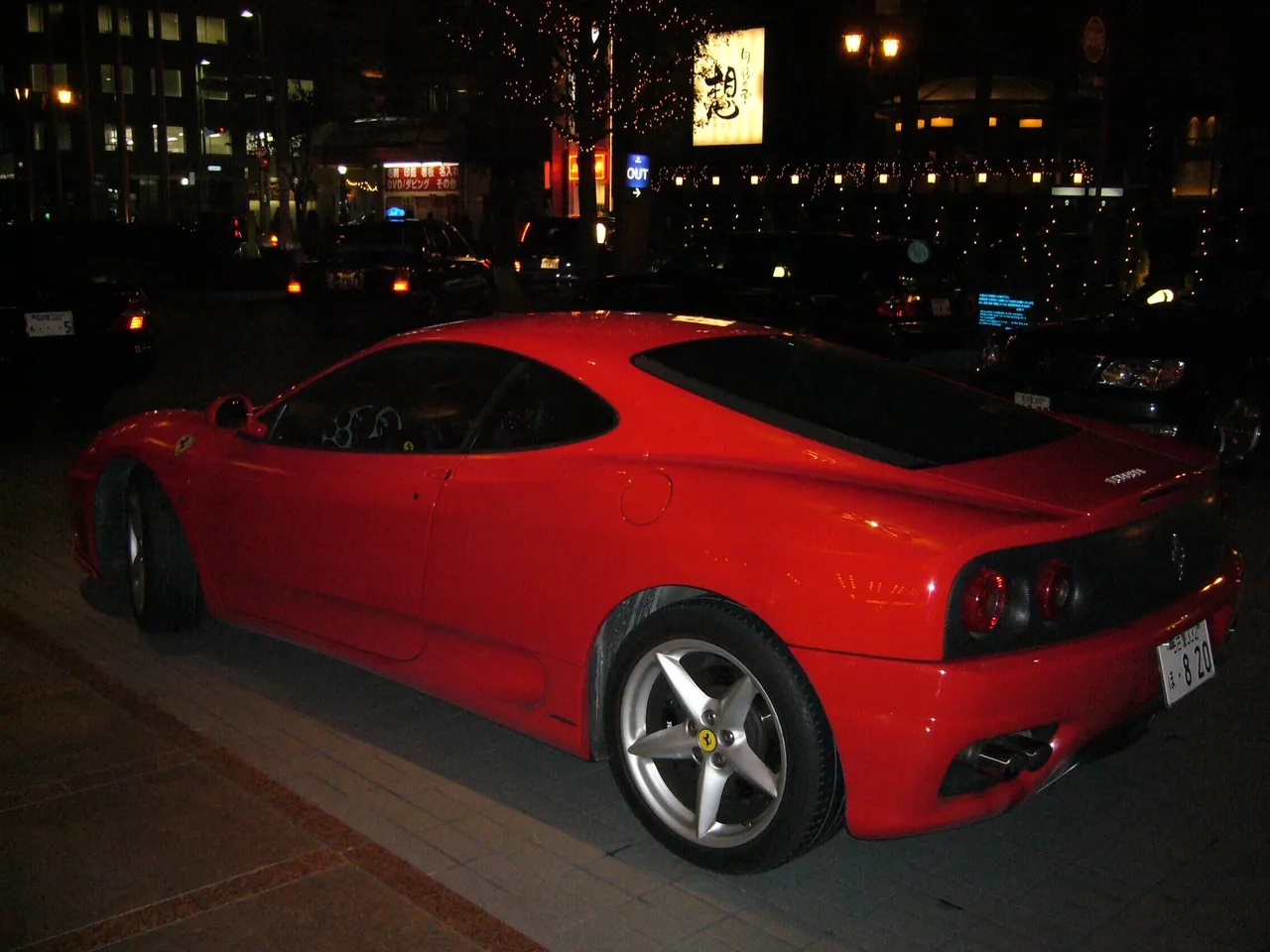 591 - Yes it is a Ferrari parked outside my brother's hotel in Nagoya.  See the Hotels section for the view from the lobby of his hotel.