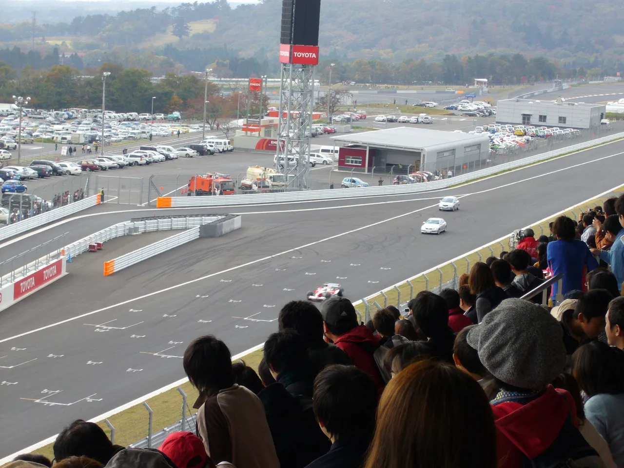 245-And Jarno Trulli wins by a nose (and then some), even though the other cars had a HUGE head start.