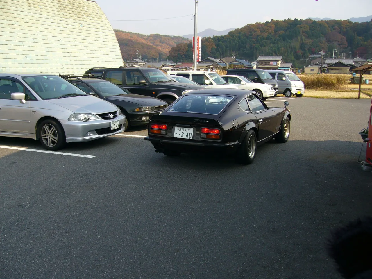 394 - Maybe the best street car here, Nissan Fairlady.  I love this car, but have a big scar on my head from where my mother crashed hers when I was riding shotgun.