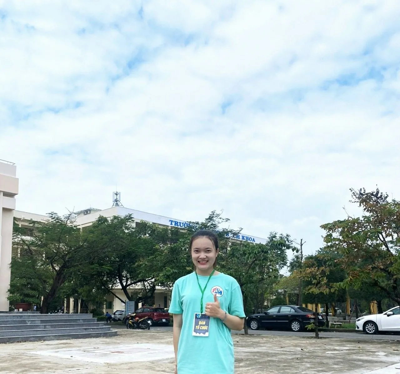 Here I am wearing the representative shirt of the faculty at the University courtyard