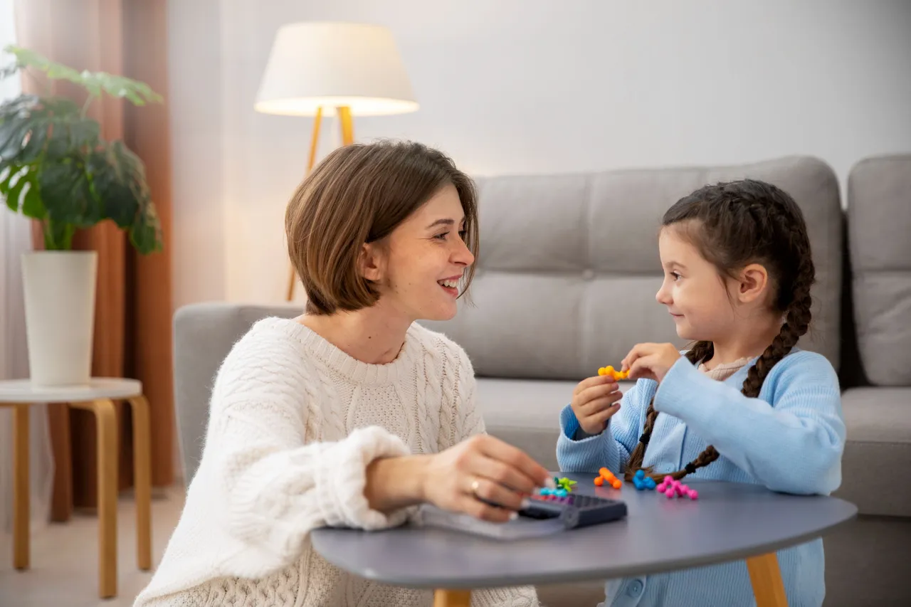 front-view-mother-kid-playing-memory-game.jpg