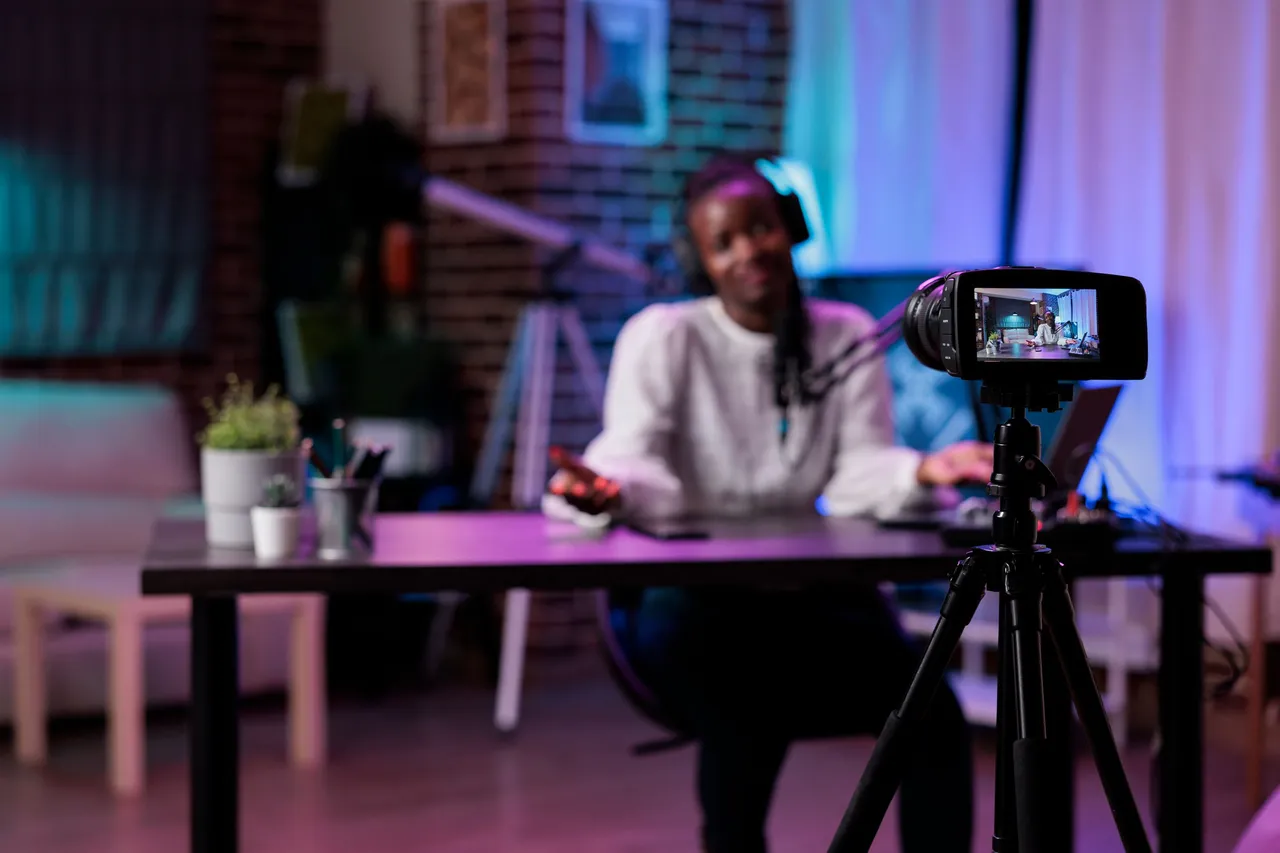 online-influencer-creating-fun-podcast-content-with-videoblog-recording-live-discussion-broadcast-social-media-channel-happy-lifestyle-blogger-using-vlogging-equipment.jpg