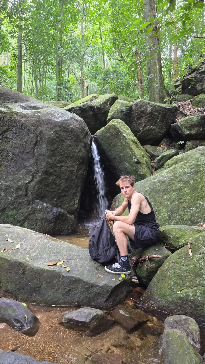 me not realizing i was geting my photo taken before i cooled off in that little waterfall