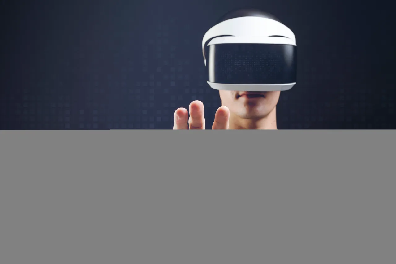 man-with-vr-headset-touching-invisible-object.jpg