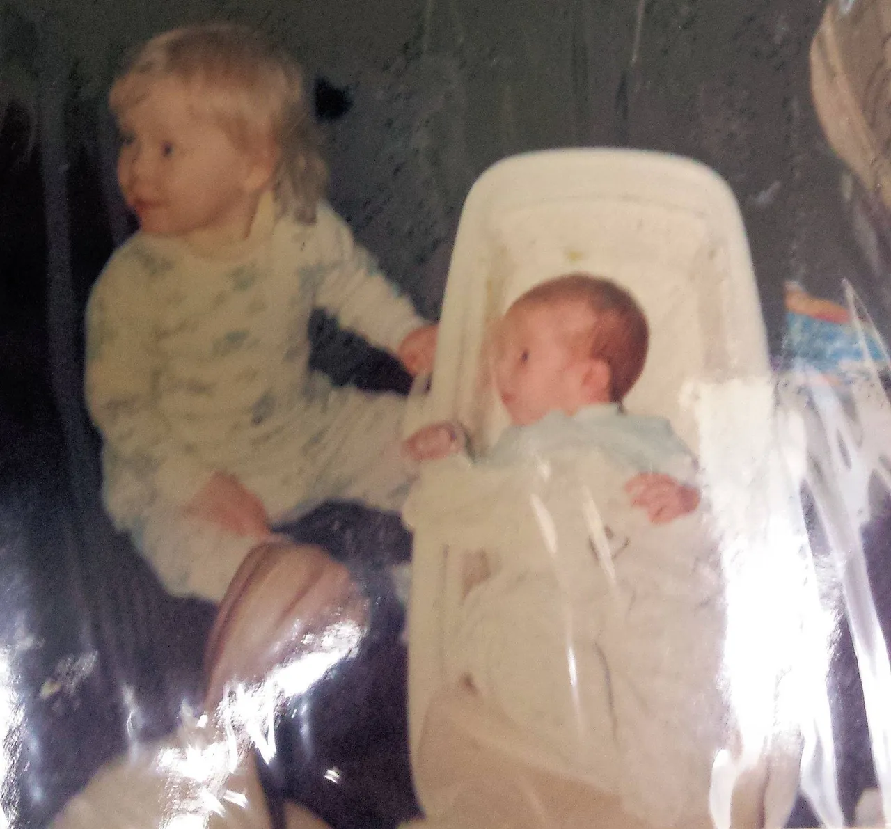 1982 Katie and Baby Rick in crib.jpg