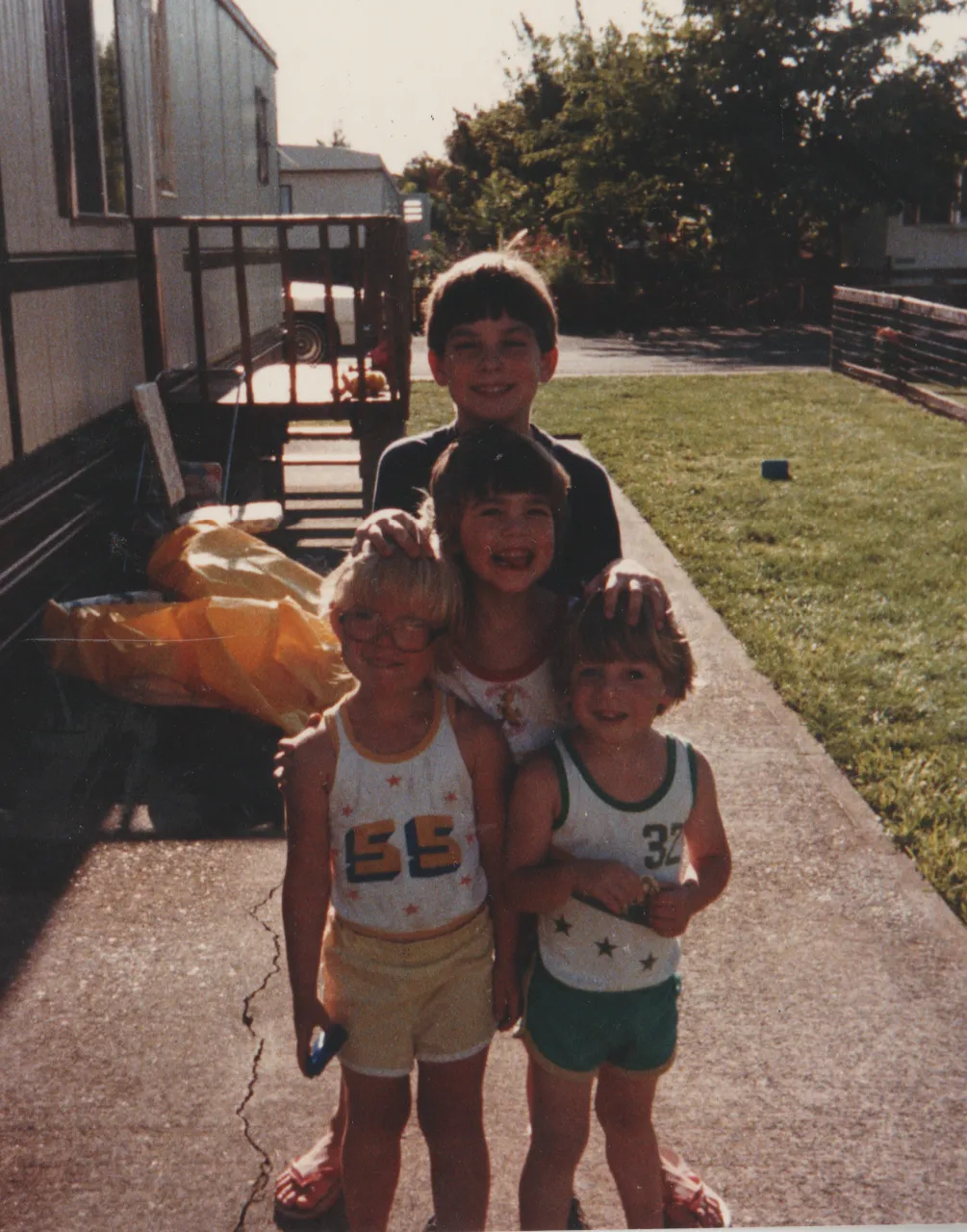 1985-08-16 - Friday - Nathan almost 9, Alan at 4.5, Katie 5, Rick at 3.5, at 163, behind front porch.png