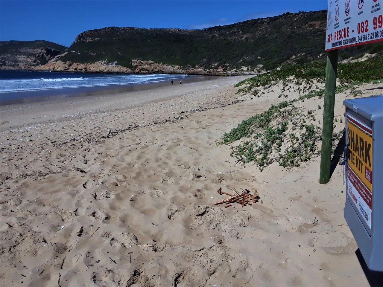 Beautiful but with a wild edge as unseen sharks lurk offshore, facing west