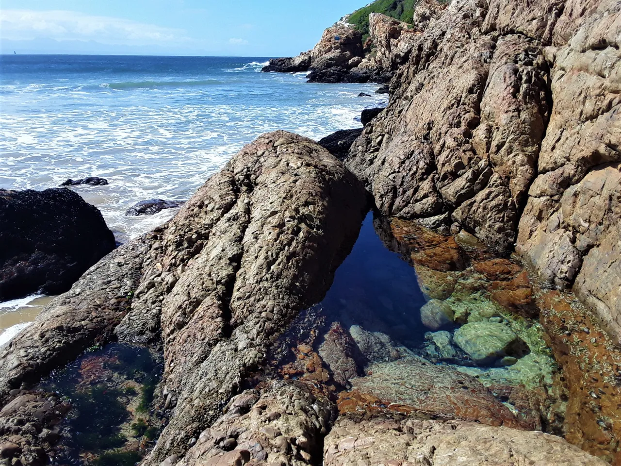 Where the beach meets the peninsula at the corner of paradise