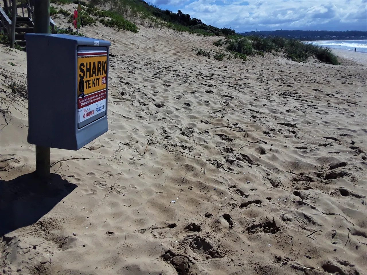 Shark bite kit posted in places along the beach, facing east - the seals attract sharks which have been known to attack swimmers every few years