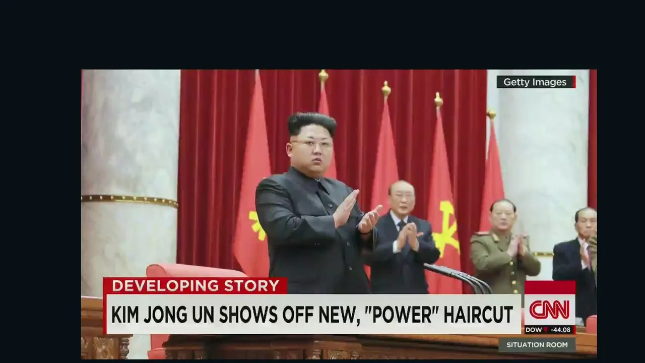 8-kim jong un shows off new power haircut.jpg