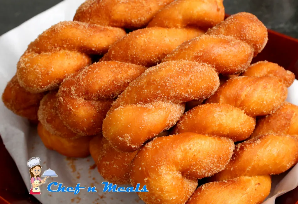 Making homemade *shakoy* was a bonding moment between me and lolo. It's made out of dough. I remember I used to help him knead the dough, cut to little pieces, and twist them vertically. Then, we fry and coat them with sugar.