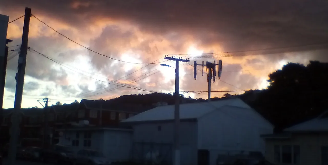 SunsetThroughImpendingThunderstormOverWellington20November2019.png