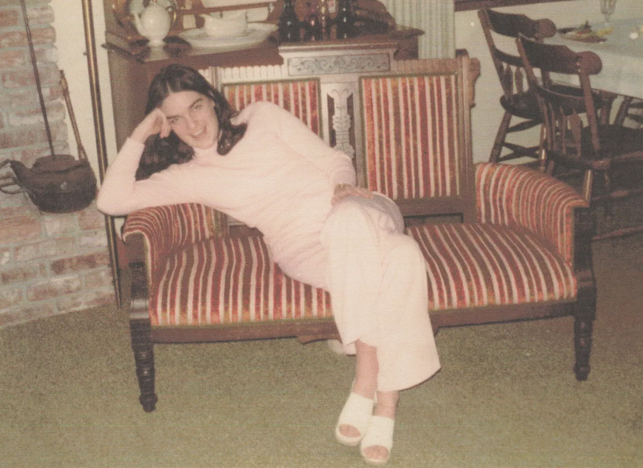 1970's maybe of Karen Williams in Light Pink, Couch.jpg
