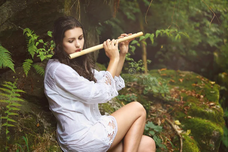 beautiful-woman-playing-flute-rain-forest-romance-fantasy-44559569.jpg