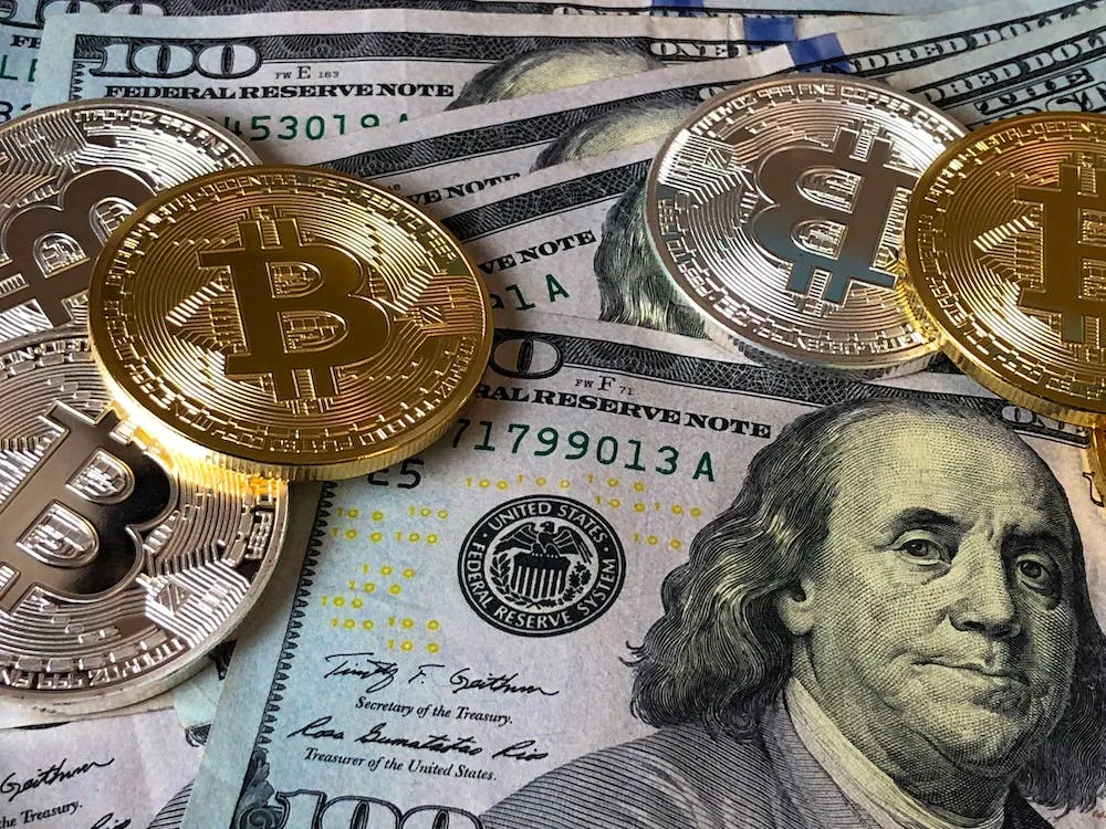 "Bitcoins and U.s Dollar Bills"
