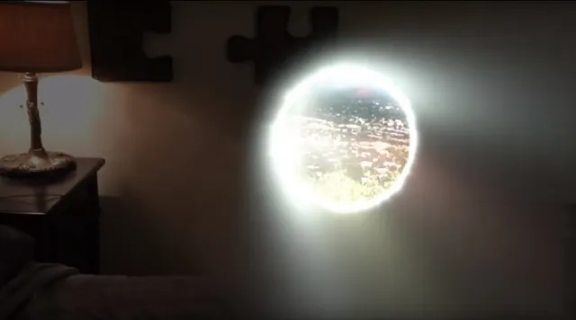 Man opens up portal.jpg