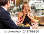 stock-photo-beautiful-couple-having-romantic-dinner-at-restaurant-back-view-of-man-proposing-to-woman-in-249789850.jpg