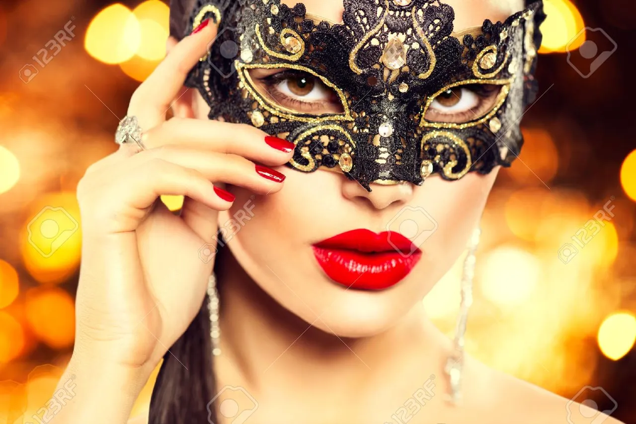 34792222-sexy-woman-wearing-carnival-mask-over-holiday-glowing-background.jpg