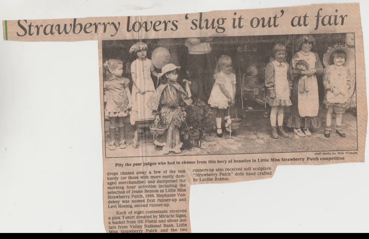 1986 - Miss Strawberry Patch, Katie, Molly, in the newspaper.png