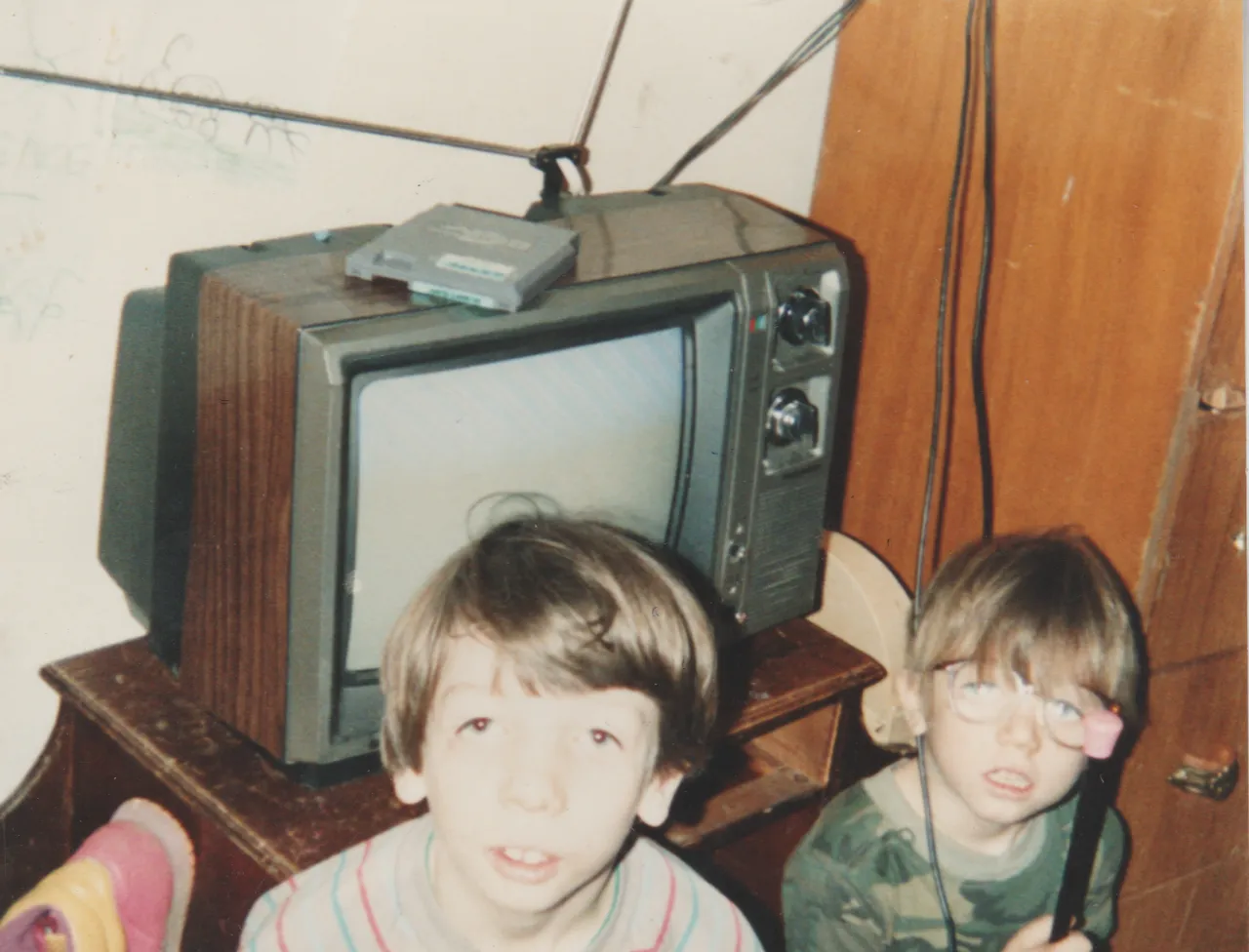 1991-12-25 - Wednesday - Christmas 1991 - Rick, Joey, TV, NES game, drawing on the wall, dresser-3.png