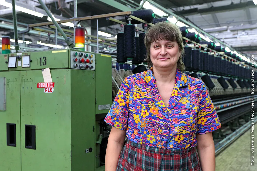 The operator of a spinning machine at a worsted mill