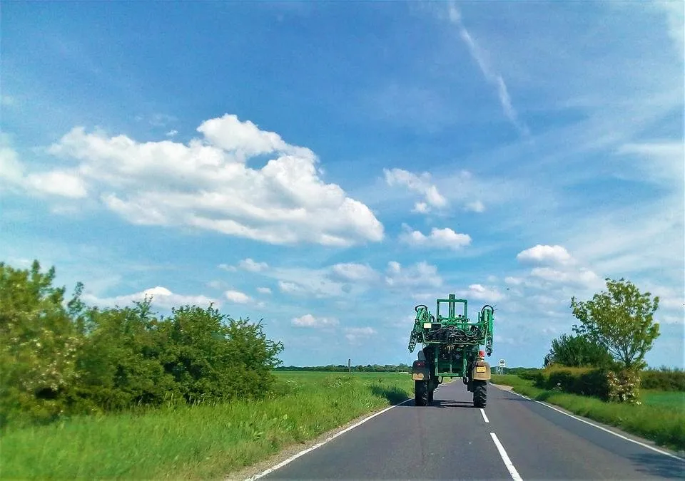 young farmer in a tractor.jpg