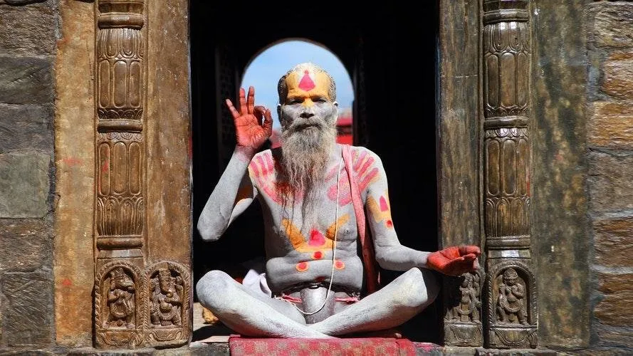 sadhu in ash unsplash.jpg