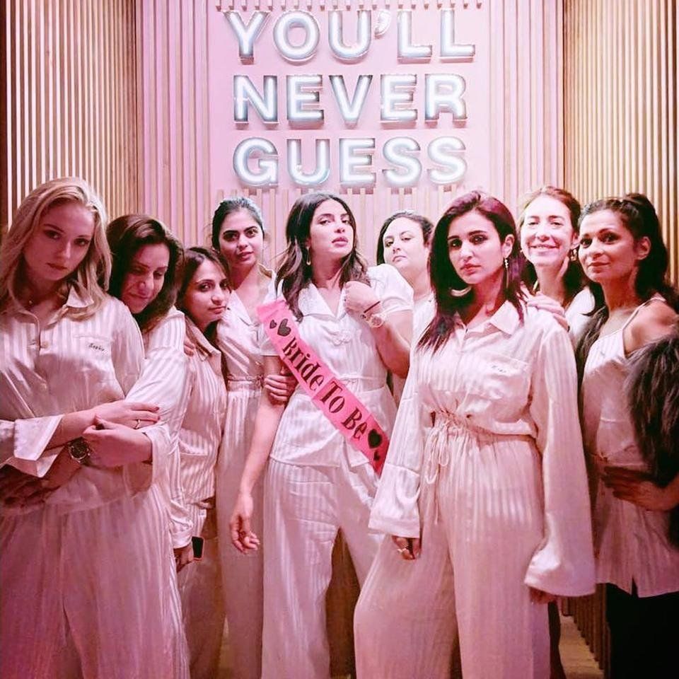 Priyanka-Chopra-Pink-Striped-Pajamas-Bachelorette-Party.jpg