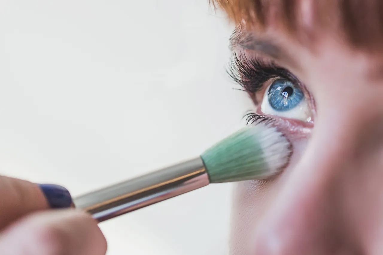 blue-eyes-getting-makeup-close-up_4460x4460.jpg