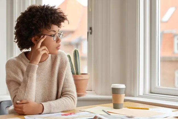 photo-contemplative-woman-with-afro-hairstyle-wears-round-spectacles-casual-warm-sweater_273609-18044.jpg