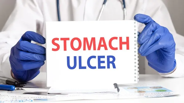 doctor-holding-card-with-text-stomach-ulcer-both-hands-medical-concept_384017-163.jpg