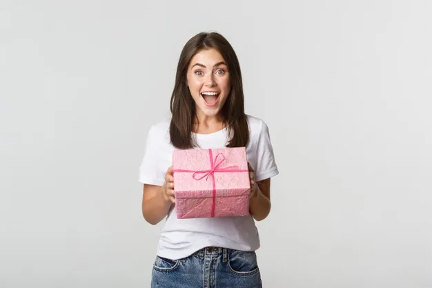 surprised-happy-birthday-girl-receiving-wrapped-gift-white_1258-19126.jpg