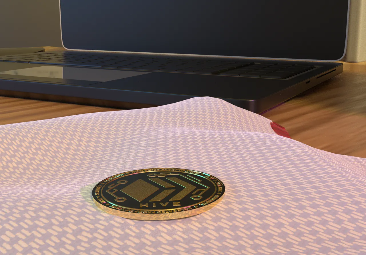 Render of HIVE coin on a T-Shirt with Laptop in background