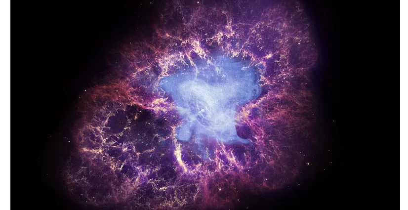 1075pxCrab_Nebula_NGC_1952_composite_from_Chandra,_Hubble_and_Spitzer.png
