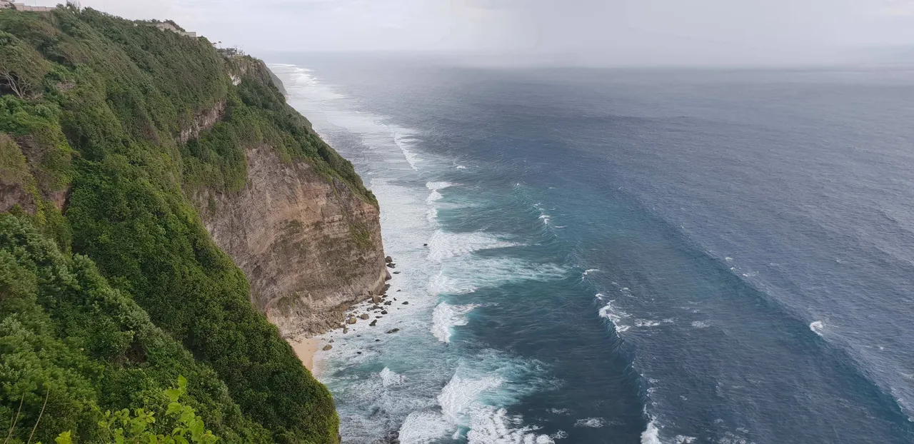 Surreal view of the cliff from the SkyPool at Oneeighty° clifftop club