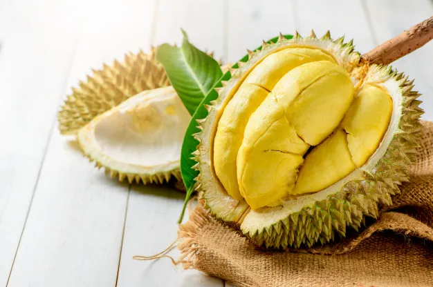 fresh_durian_durio_zibthinus_murray_sack_old_wood_background_king_fruit_from_thailand_summer_season_34435_4015.jpg