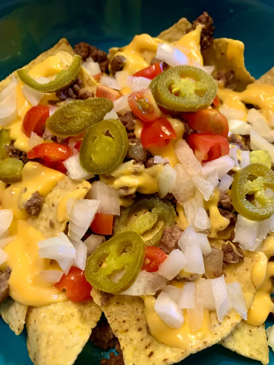 clsousryd00wj5fsz1ml76aco_Nachos_with_jalapenos.webp