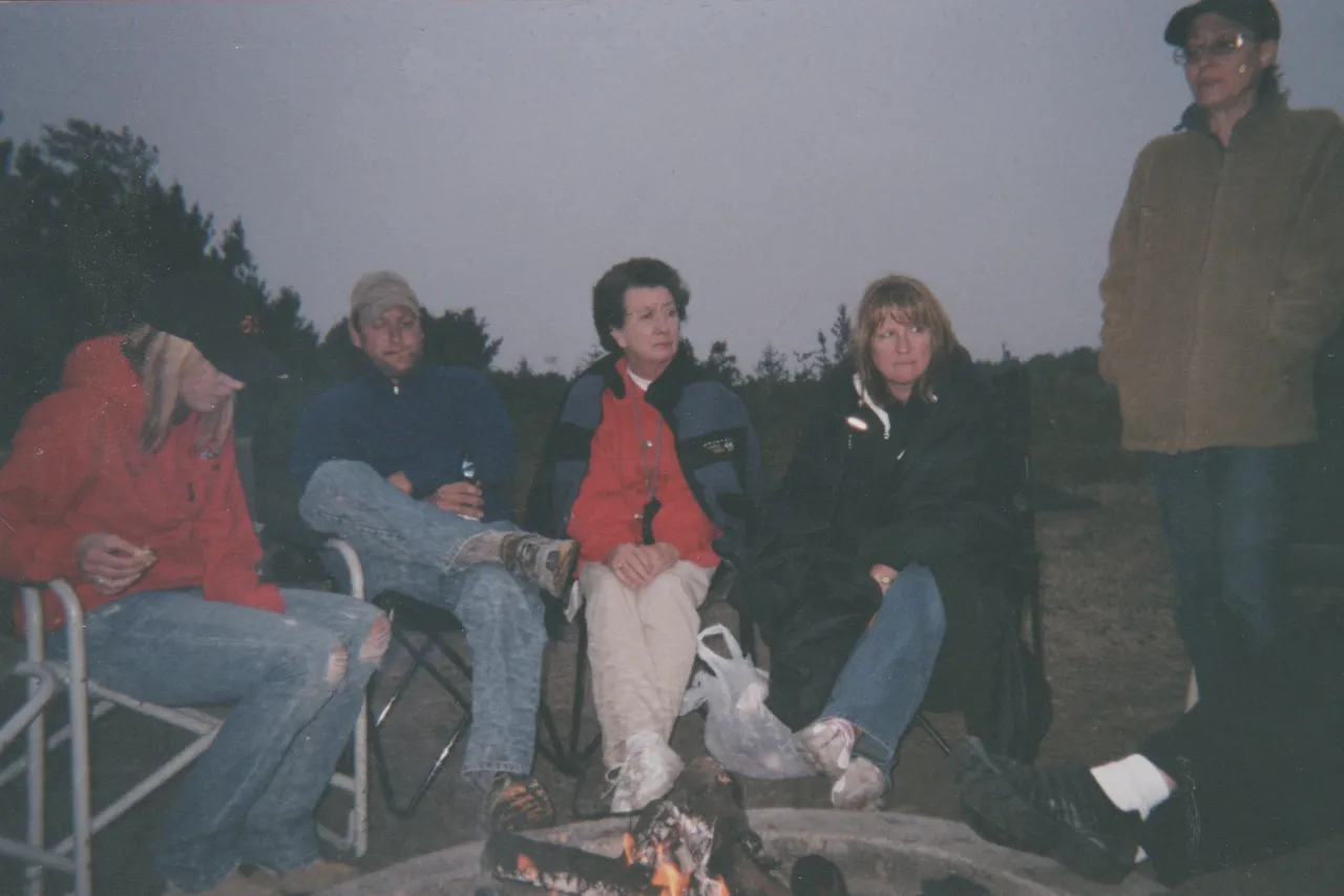 2006 maybe at a reunion guys around maybe a campfire.jpg