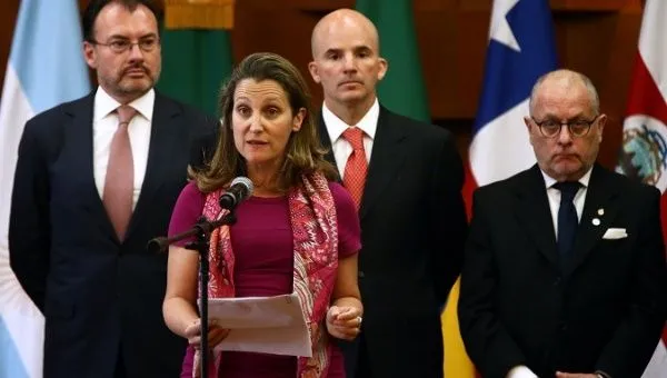 Freeland with Lima Group.jpg
