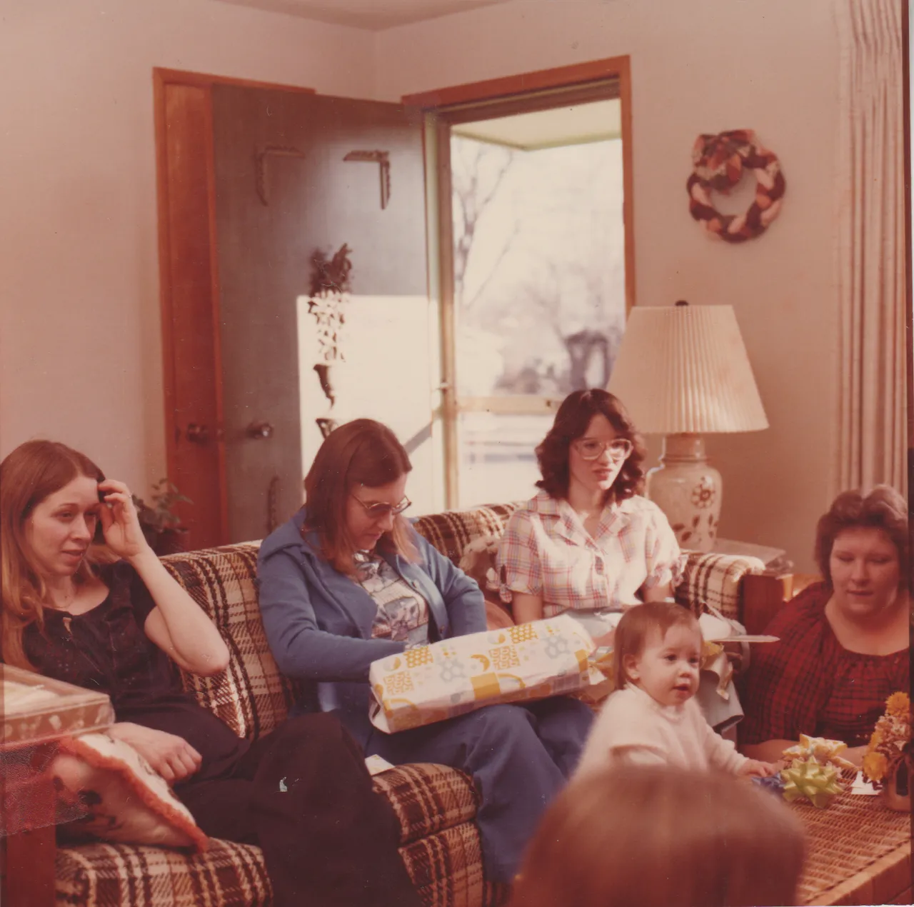 1980-02 - Wedding Shower - Marilyn Morehead opening a present, Laurie, Brittany, Margy, a girl.png