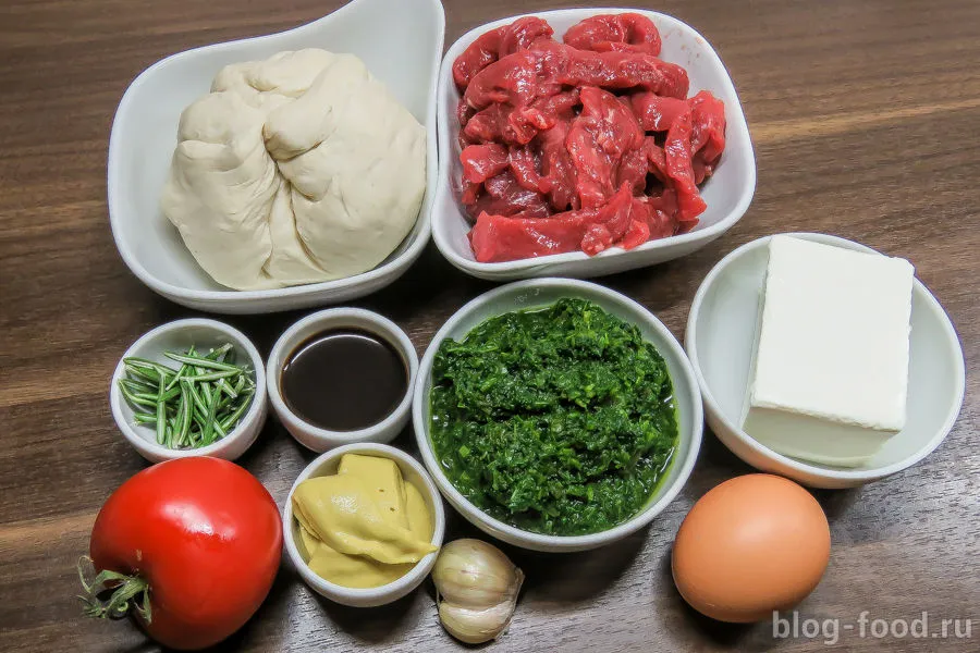Pie with beef, cheese and rosemary