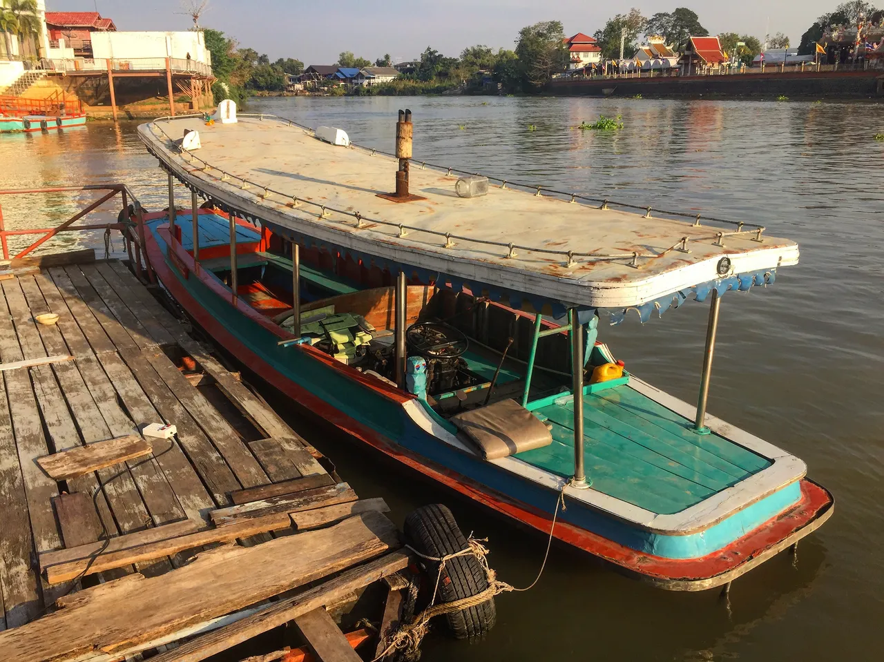 One of the many, many long-tail boats.