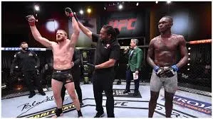 1615188596No regrets, I’ll rise again, Israel Adesanya vows.jpg