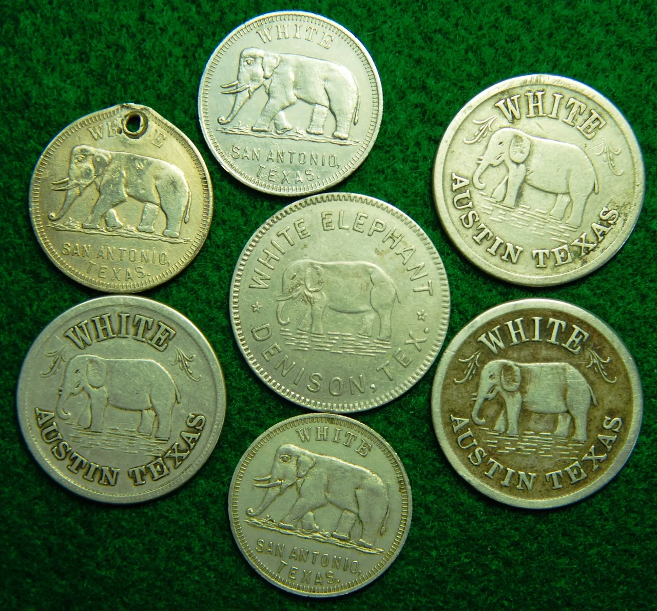 old merchant "elephant" trade tokens