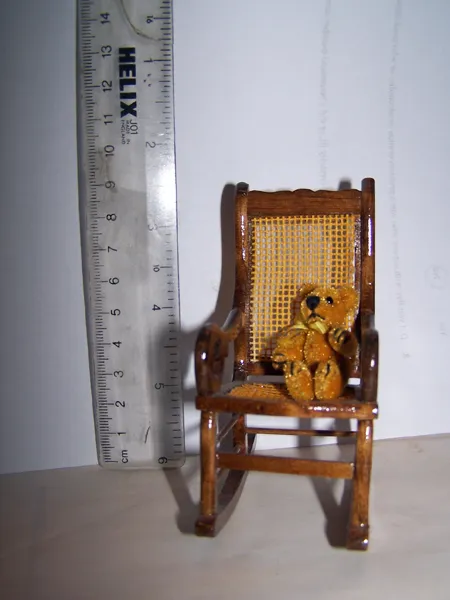 Tiny teddy in rocker crop May 2016.jpg